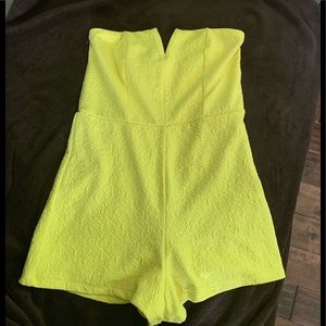 Yellow romper with floral design